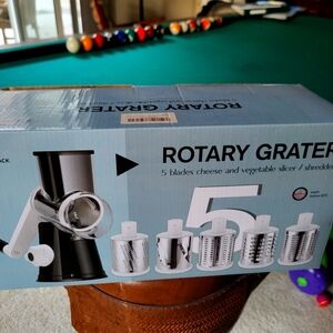 Rotary grater with 5 attachments, new in box